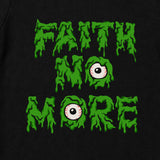 Close up of Faith No More Babtgrow with Slime Sludge Eye Logo printed on a plain black babygrow