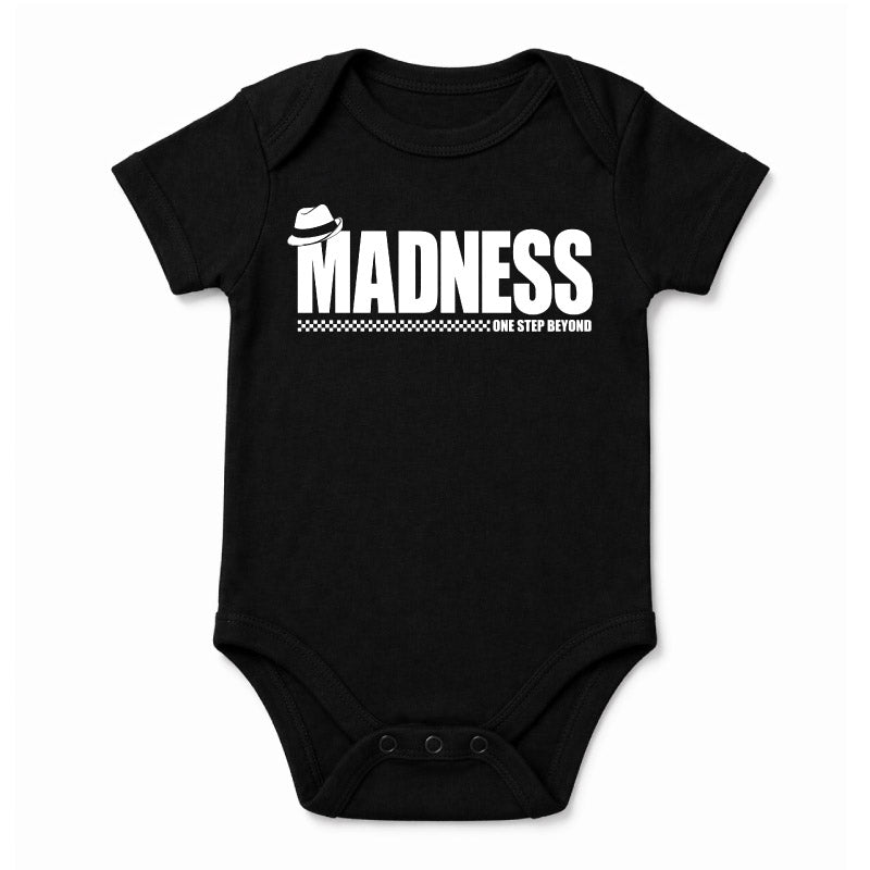Madness One Step Beyond Babygrow. White Madness Logo and One Step Beyond Artwork on a Black Babygrow