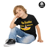 Child sitting down wearing a kids black t-shirt with The Beatles Yellow Submarine image 