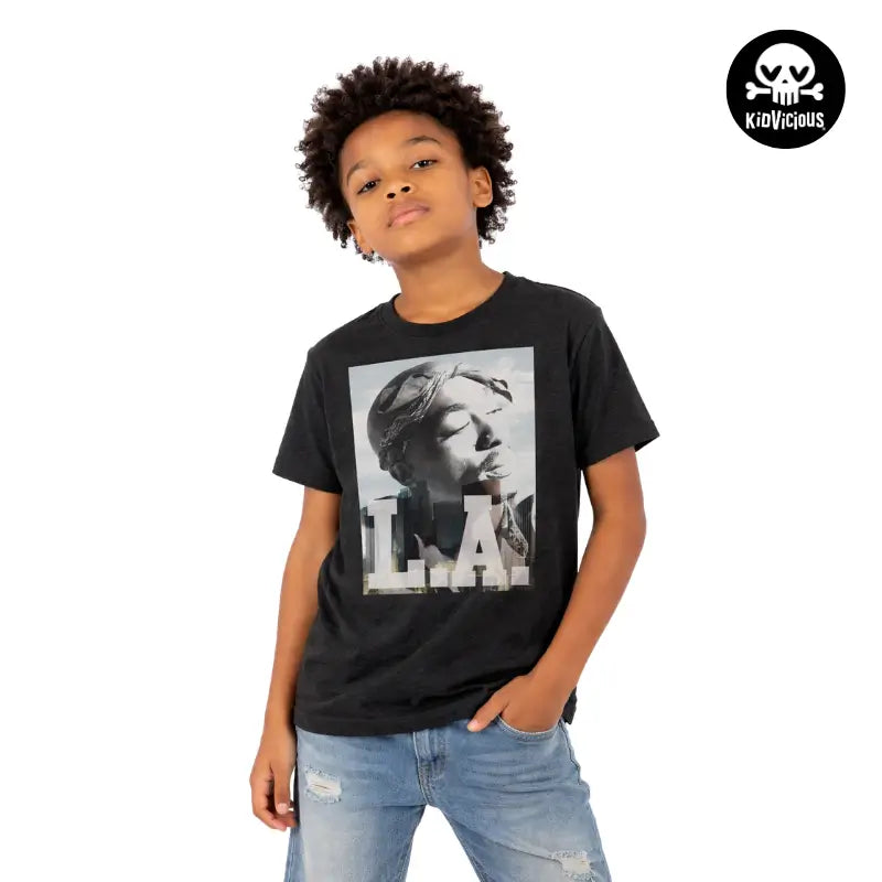 Cool Young Boy Wearing a Black Tupac Shakur LA Skyline Kids T-shirt