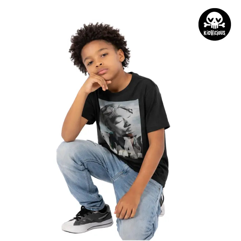 Cool Young Kid Wearing a Black 2pac LA Skyline Kids T-shirt